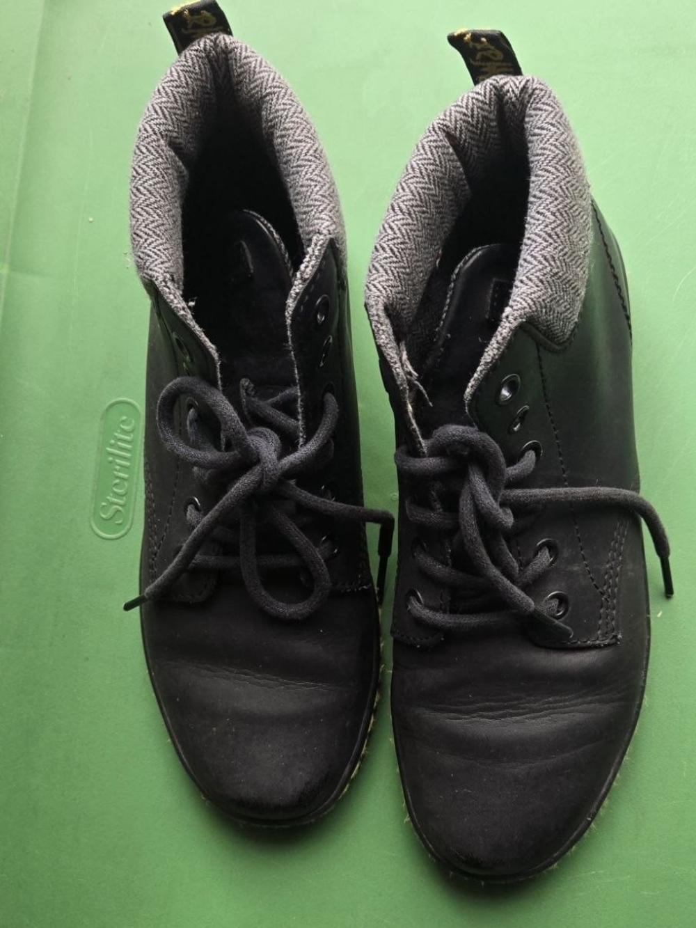 Dr. Martens Black Leather Boots with Gray Herringbone Lining